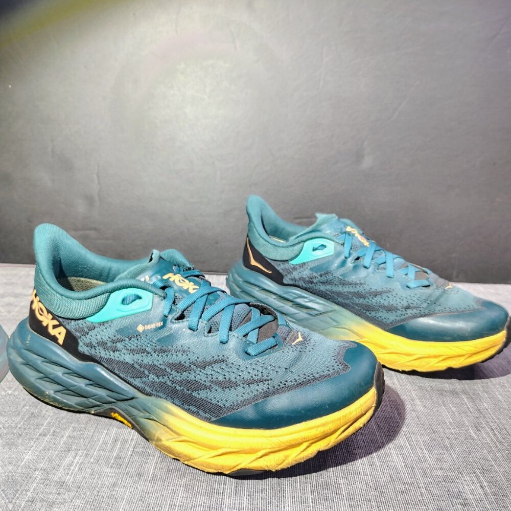 Hoka One One Teal and Yellow Athletic Shoes